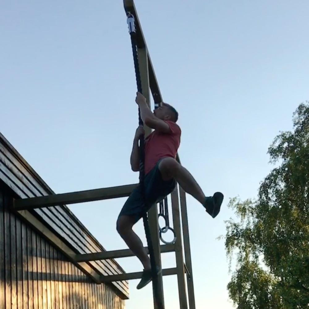 Nicklas doing rope climbs